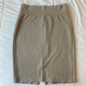 Beige short pencil skirt with slit on back